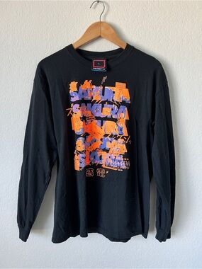 Japanese streetwear brand Long-Sleeve Graphic Tee with Orange & Purple Print